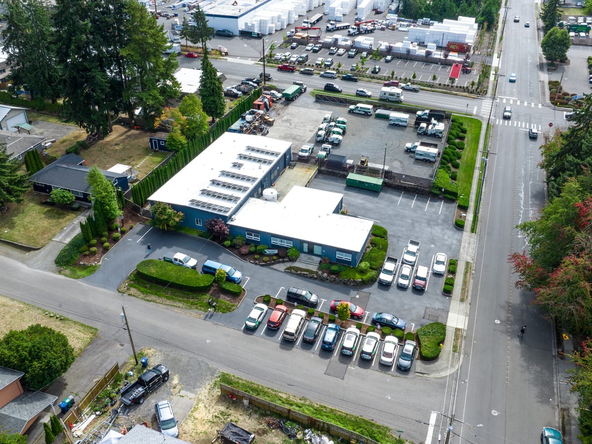 Aerial drone view of a commercial parking lot