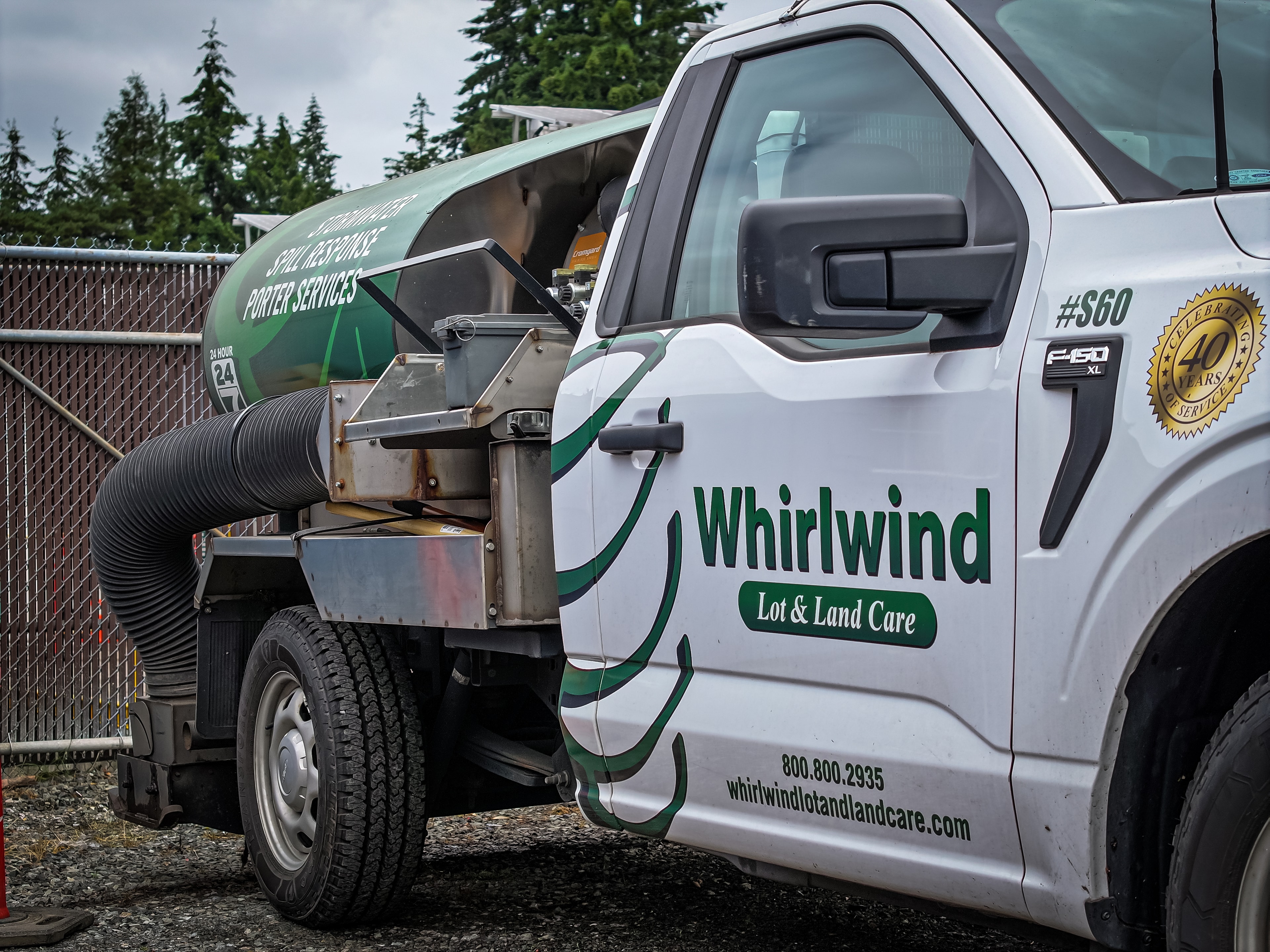 Whirlwind sweeping truck at a commercial property